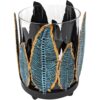 Southwest-style metal feather candle holder with removable glass hurricane chimney.