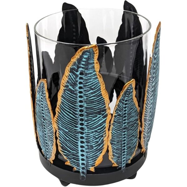 Southwest-style metal feather candle holder with removable glass hurricane chimney.