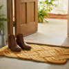 4e4a4bea-6217-4bed-a796-b9142e2d6f9b Handwoven 24x17 tan and yellow nautical rope doormat for entry ways.
