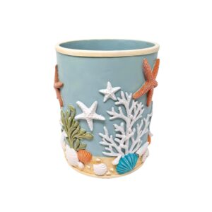 3D resin ocean wastebasket with seashells and starfish beach decor.
