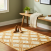 Handcrafted 24x36 inch natural jute rug featuring a classic braided diamond pattern.