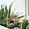 Six colorful porcelain mushroom stakes for fairy gardens and potted plants.