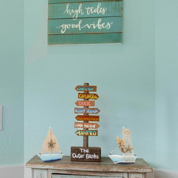 Set of two nautical wooden sailboats with beach-themed ocean accents.