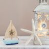 Set of two nautical wooden sailboats with beach-themed ocean accents.