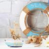 Set of two nautical wooden sailboats with beach-themed ocean accents.
