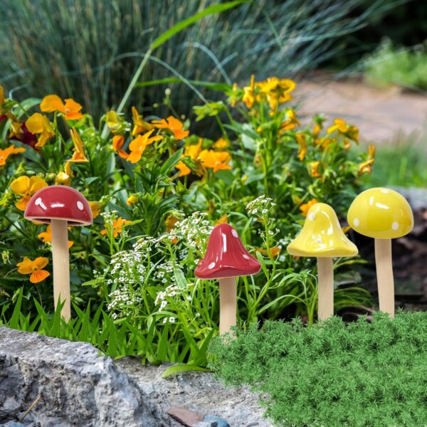 Six colorful porcelain mushroom stakes for fairy gardens and potted plants.