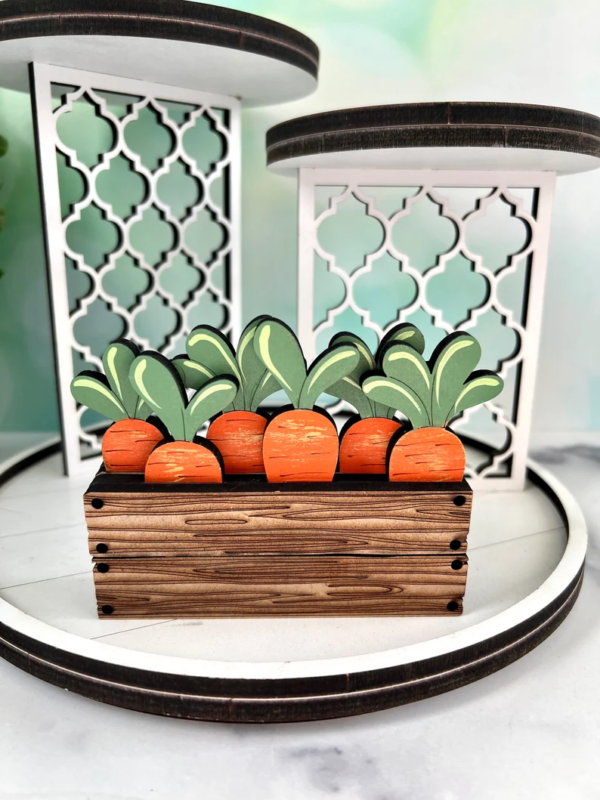 A0b769bb929294240bb97b7439d5db1700 Adorable wooden Easter decor featuring a cute bunny diving into carrots.