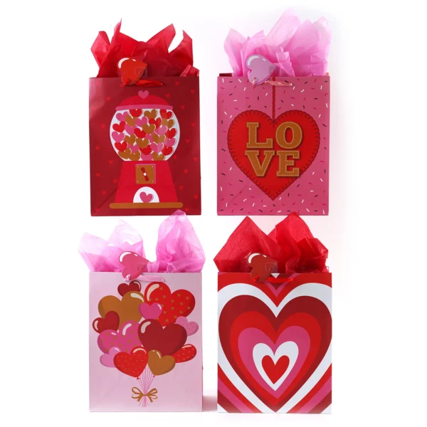Four unique extra-large Valentine gift bag designs featuring various happy heart patterns.
