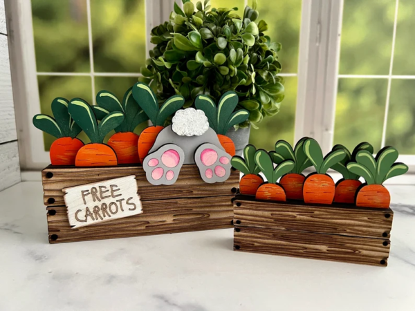 Ab077c23c600d475c838613817b00f13bK Adorable wooden Easter decor featuring a cute bunny diving into carrots.