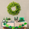 Festive St. Patrick's Day artificial shamrock garlands and wreaths for lucky door decor.
