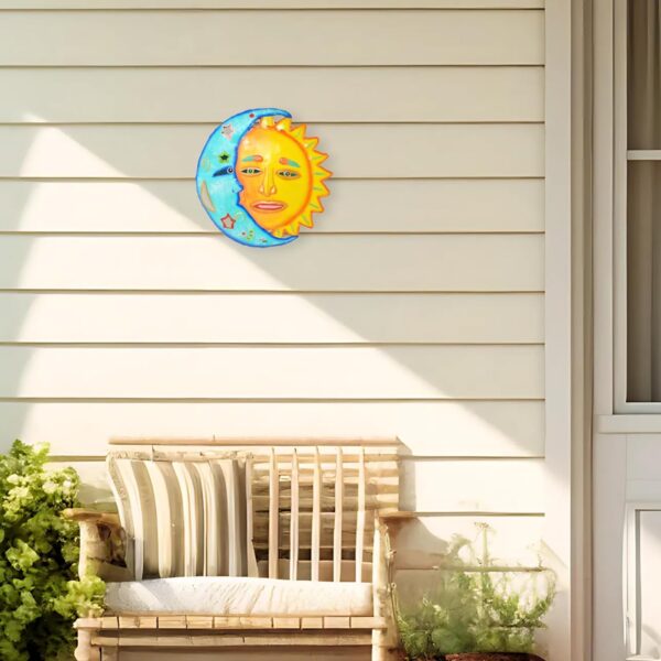Handcrafted Haitian metal sun and moon face wall art decor.