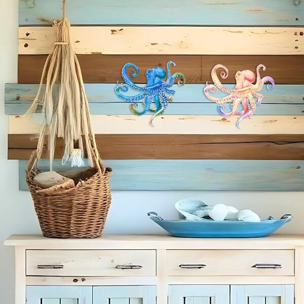 Vibrant set of two embossed metal octopuses for coastal decor.