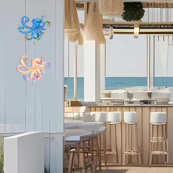 Vibrant set of two embossed metal octopuses for coastal decor.